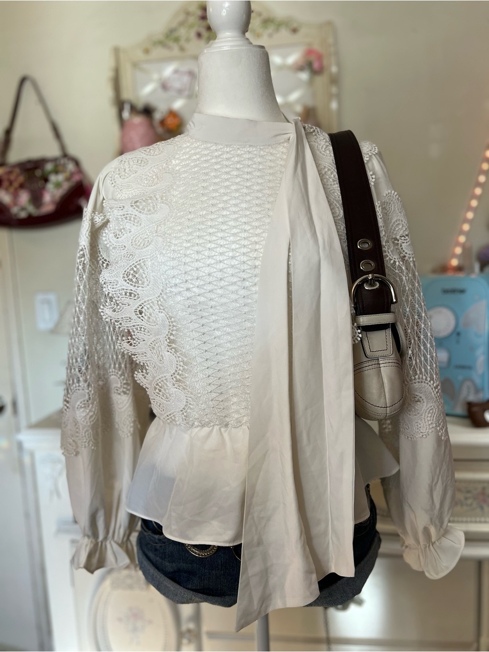 White Lace-Paneled Peplum Blouse with Neck Tie